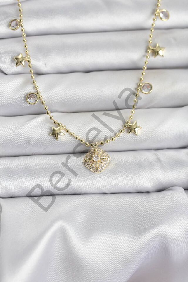Pirinç Gold Renk Zirkon Taşlı Kutup Yıldızı Model Kadın Kolye