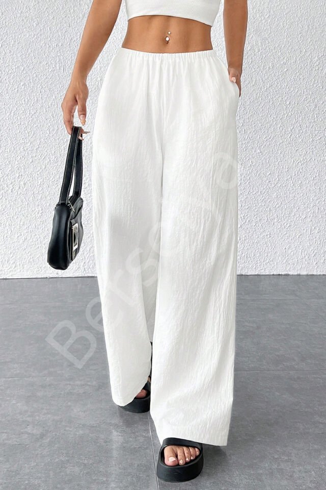 Kadın Beyaz Bol Kesim Cepli Geniş Paça Dökümlü Pantolon