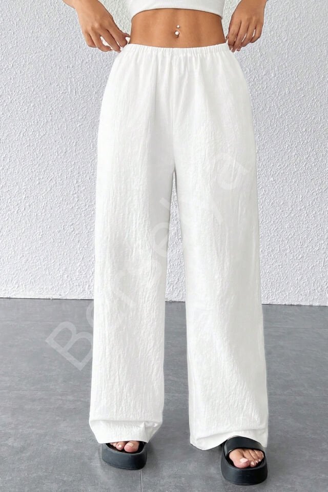 Kadın Beyaz Bol Kesim Cepli Geniş Paça Dökümlü Pantolon
