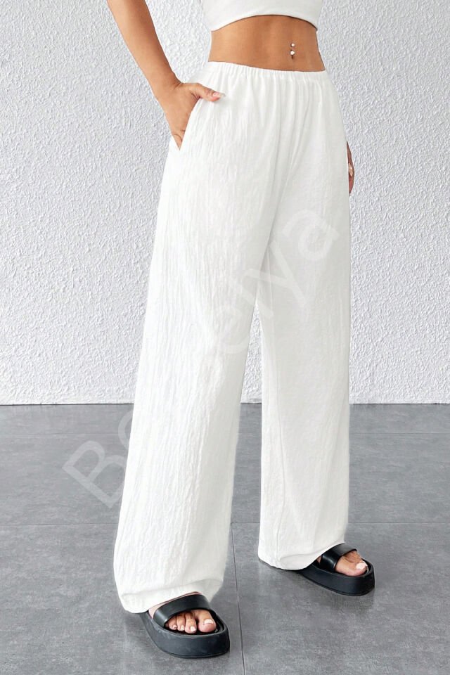 Kadın Beyaz Bol Kesim Cepli Geniş Paça Dökümlü Pantolon